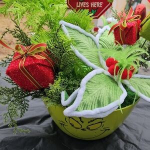 Grinch Themed Decorative Bowl with Greenery and Red Accents